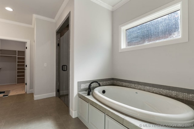 bathroom featuring independent shower and bath, crown molding, and tile patterned floors