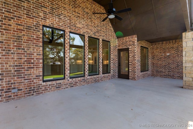 view of patio / terrace featuring ceiling fan