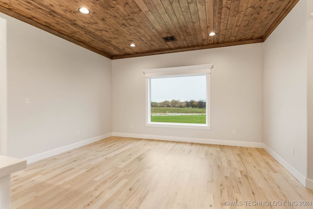 empty room with light wood-type flooring, wood ceiling, and ornamental molding