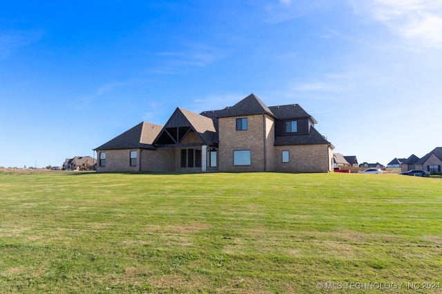 view of front of home with a front yard