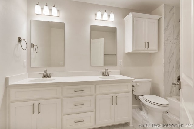 full bathroom featuring vanity, toilet, and tiled shower / bath