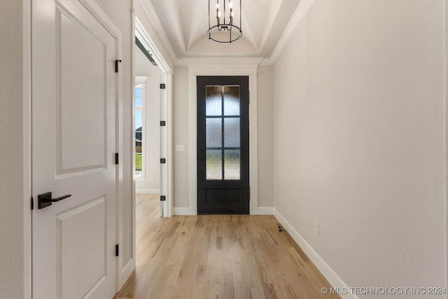 foyer featuring light hardwood / wood-style floors and ornamental molding