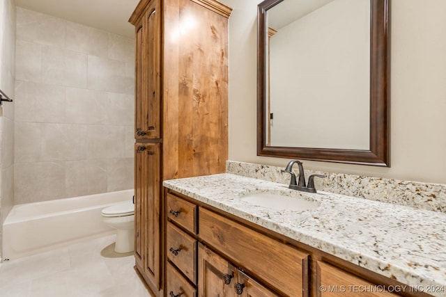 full bathroom featuring vanity, tiled shower / bath combo, toilet, and tile patterned floors