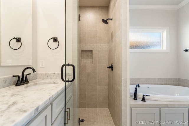 bathroom with vanity, crown molding, and shower with separate bathtub