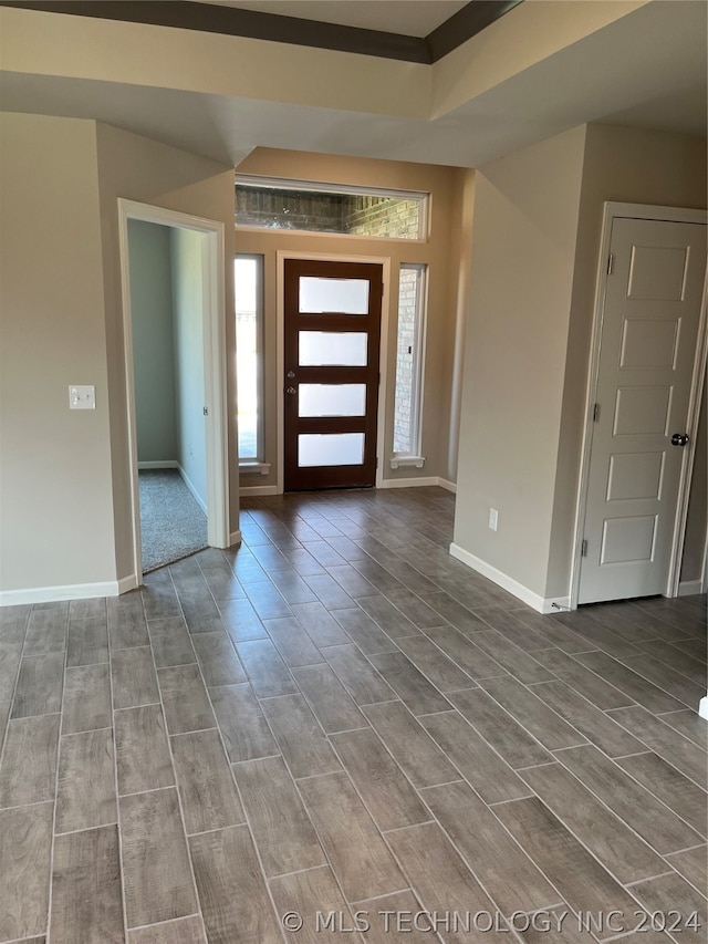 foyer with hardwood / wood-style floors