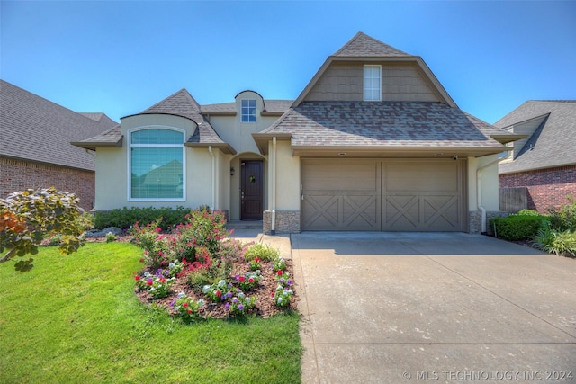 view of front of home with a front lawn