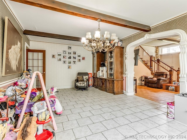 rec room with an inviting chandelier, beam ceiling, and light tile flooring