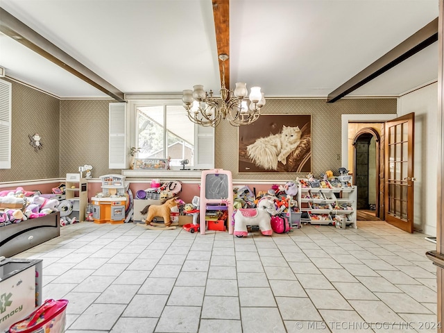 playroom with beam ceiling, an inviting chandelier, and light tile floors