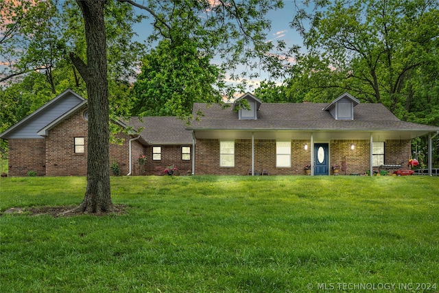 view of front of property with a front lawn