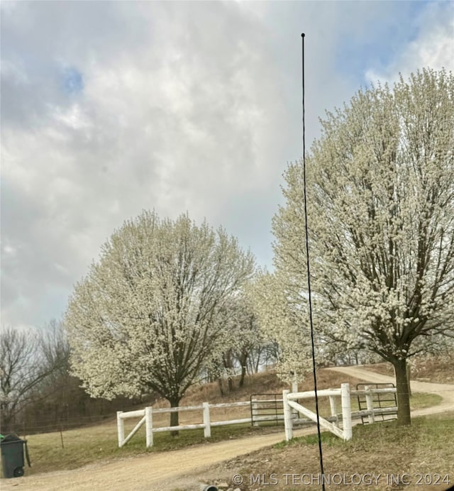 view of community with a rural view