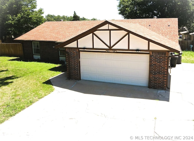 garage with a yard