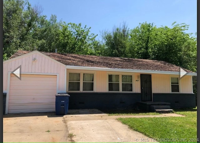 single story home featuring driveway and crawl space