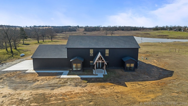 exterior space with a rural view