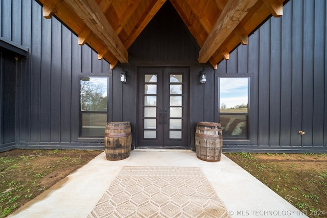 entrance to property with french doors and a patio