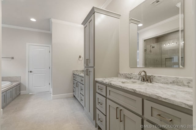 bathroom featuring vanity, shower with separate bathtub, and crown molding