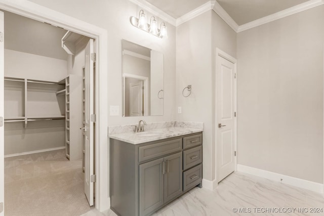 bathroom with vanity and crown molding