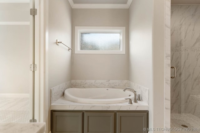 bathroom featuring independent shower and bath and crown molding