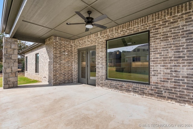 view of patio / terrace featuring ceiling fan