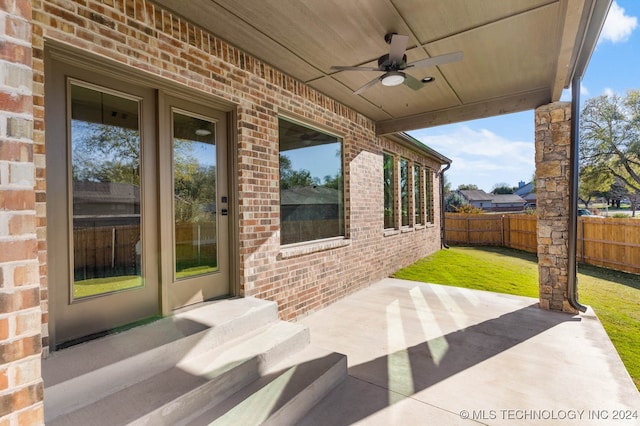 view of patio / terrace featuring ceiling fan