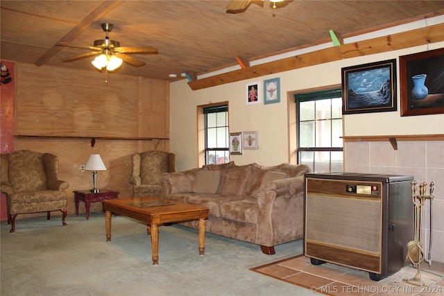 carpeted living room with wood ceiling and ceiling fan