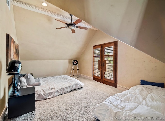 bedroom featuring vaulted ceiling, carpet floors, baseboards, visible vents, and ceiling fan