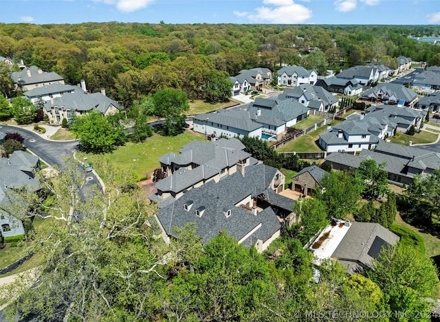 aerial view with a view of trees and a residential view