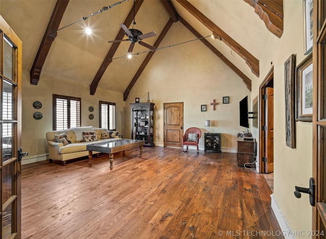 living room with beamed ceiling, wood-type flooring, and high vaulted ceiling