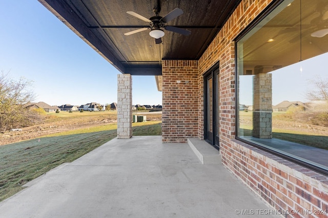 view of patio with ceiling fan and cooling unit