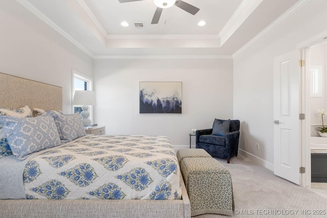 bedroom featuring a tray ceiling, ornamental molding, light colored carpet, and ceiling fan