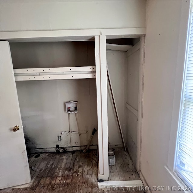 washroom featuring washer hookup and dark hardwood / wood-style floors