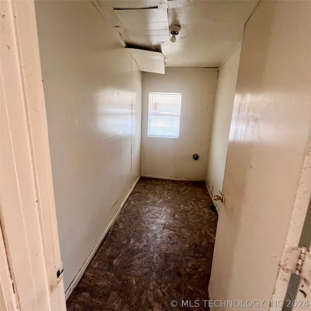 corridor with tile flooring