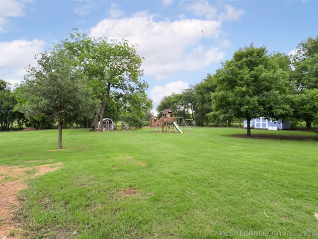 view of yard with a playground