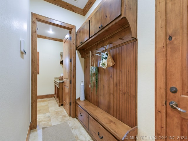 mudroom with ornamental molding