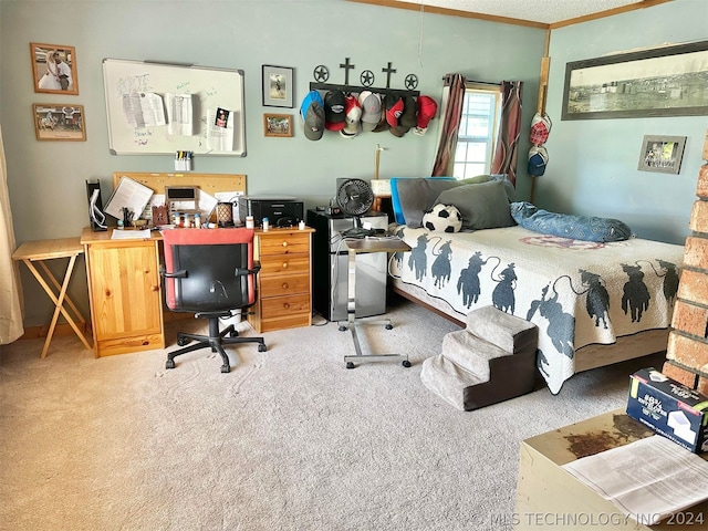 bedroom featuring ornamental molding and carpet floors