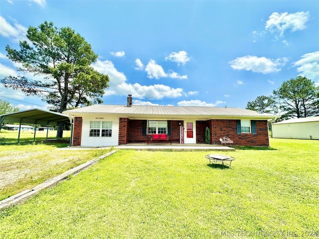 ranch-style house featuring a front lawn