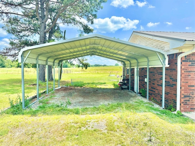 view of parking with a carport and a lawn