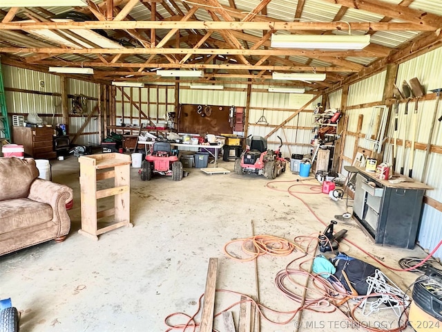 garage with a workshop area