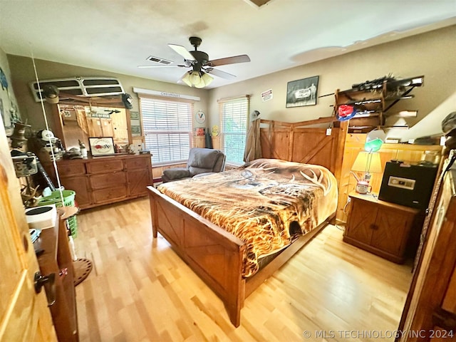 bedroom with ceiling fan and light wood-type flooring