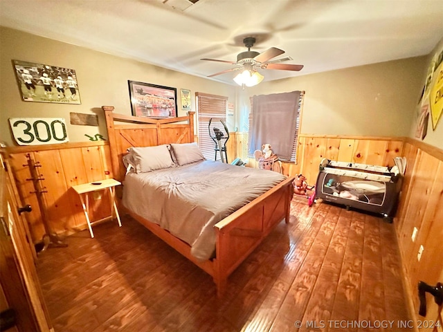 bedroom featuring hardwood / wood-style floors and ceiling fan