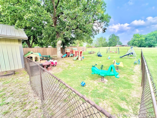 view of yard with a playground