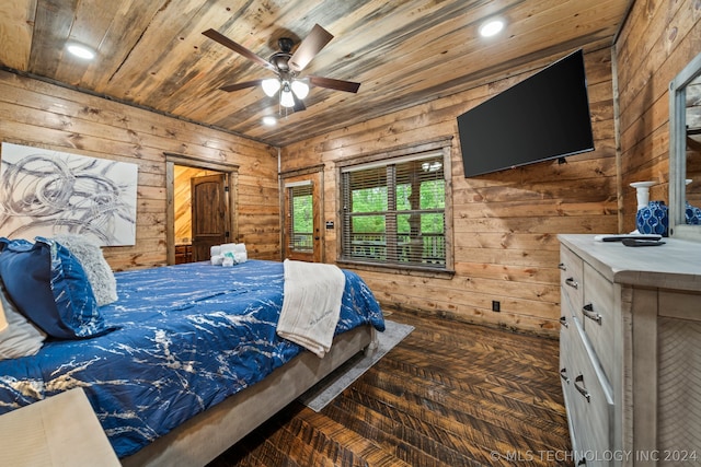 bedroom with wooden ceiling, dark hardwood / wood-style flooring, wooden walls, and ceiling fan