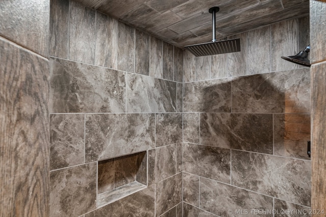 room details with a tile shower