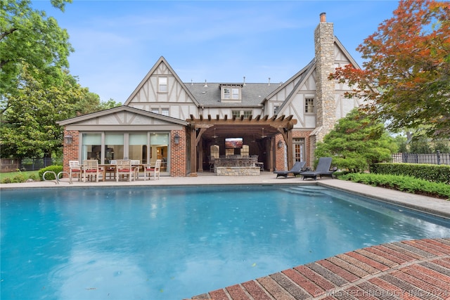 view of pool featuring a patio