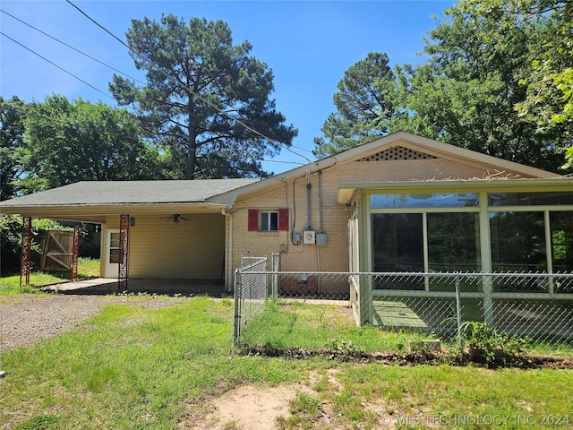 view of front facade with a carport