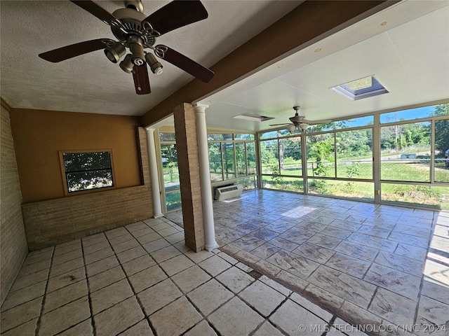 interior space featuring ceiling fan