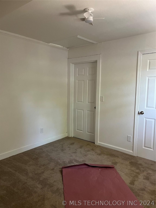 carpeted empty room with ceiling fan