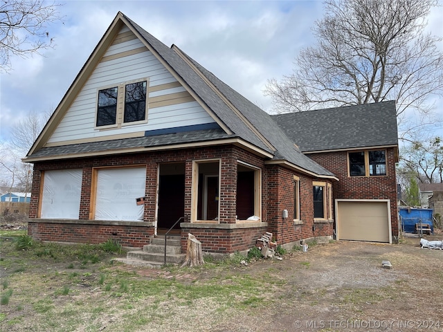 view of front of home featuring a garage