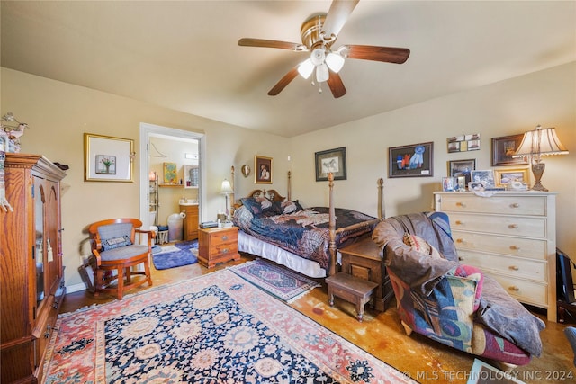 bedroom with ceiling fan and connected bathroom