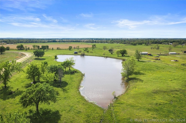 bird's eye view with a water view and a rural view