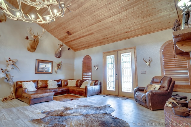 living room featuring wooden ceiling, hardwood / wood-style floors, a chandelier, and french doors